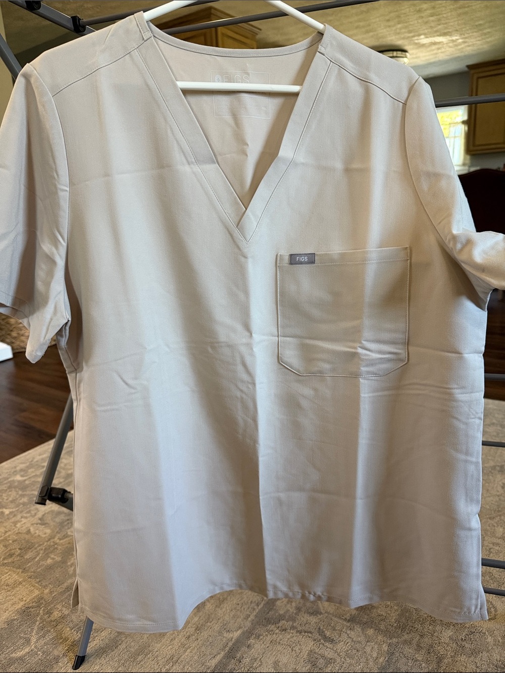 FIGS women’s V-Neck Short Sleeve Shirt in Light Beige